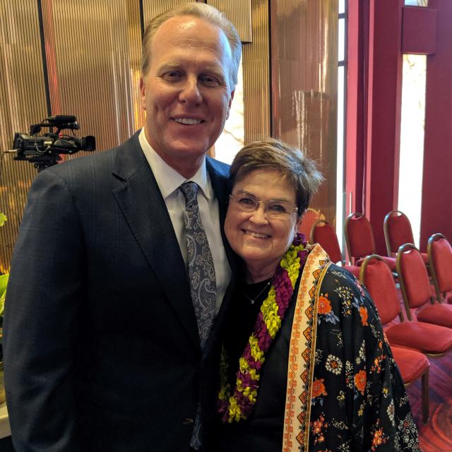 Mayor Kevin Faulconer poses with Carolyn Satter at her retirement event. Mayor Kevin Faulconer poses with Carolyn Satter at her retirement event.