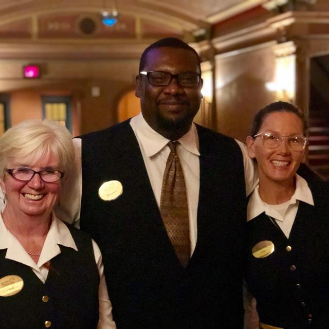 Ushers smiling in Balboa lobby Ushers smiling in Balboa lobby