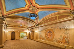Photo of the Balboa Theatre lobby with vaulted blue ceiling